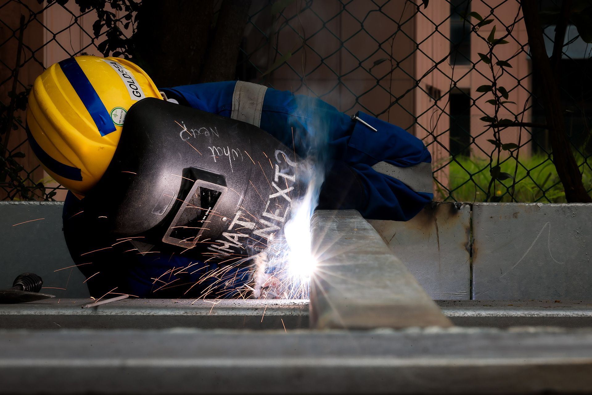 A worker at a structural steel fabrication company in Loyang.