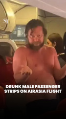 Drunk male passenger strips on AirAsia flight