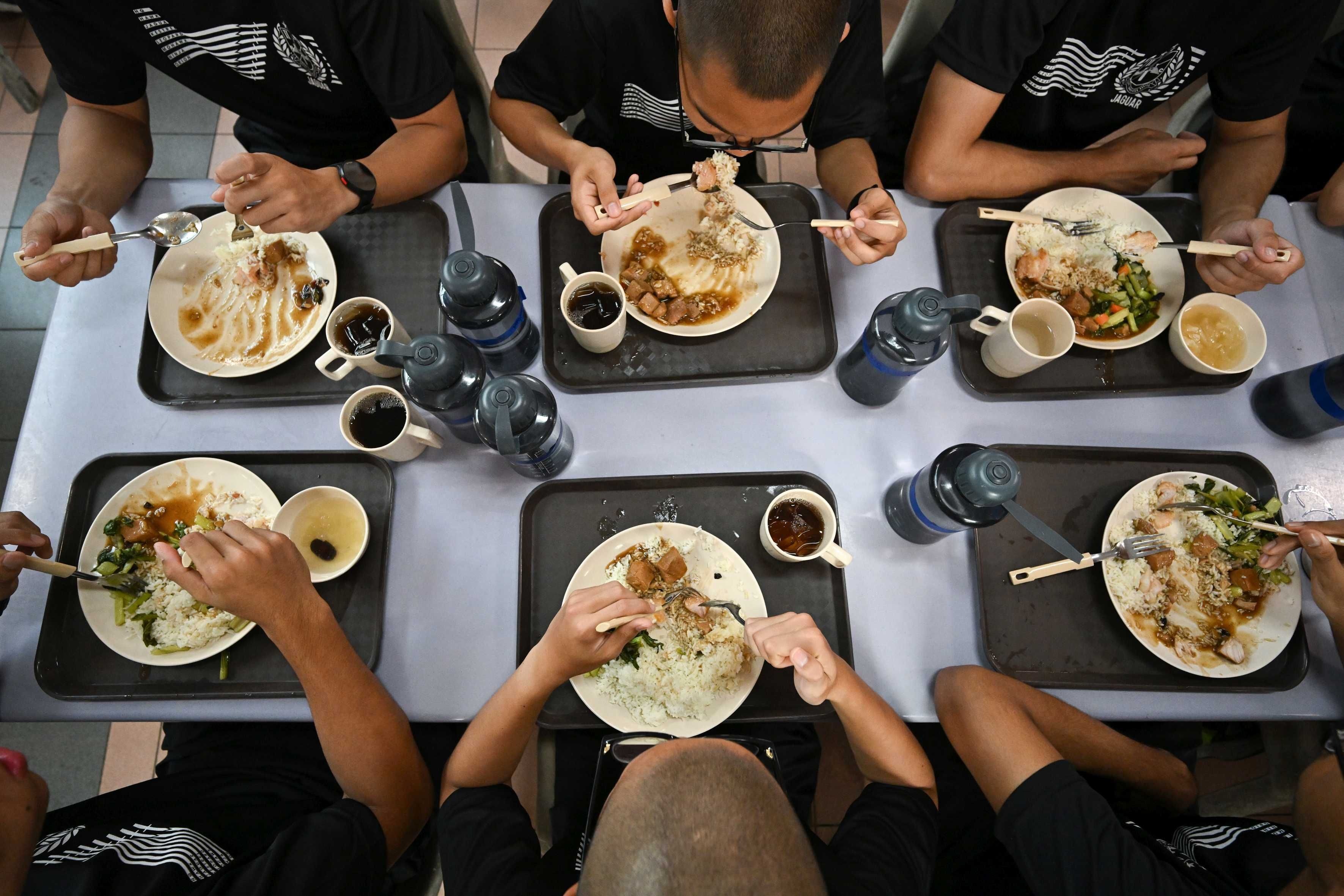 A top angle of trays of food at the Basic Military Training Centre on Pulau Tekong.
